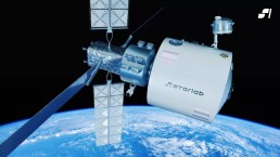 A detailed rendering of the Starlab space station orbiting above Earth, with the blue and white swirls of the planet's atmosphere visible below. The station, part of a joint venture between Voyager Space and Airbus to build and operate Starlab, features multiple solar panels and the Starlab logo.