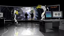 A futuristic control room features large screens displaying a global map, two silhouetted individuals observing, and robotic arms poised for operation. Multiple workstations with computer monitors and the word 