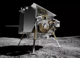 A metallic lunar lander with extended legs stands on the surface of the Moon against a pitch-black sky. The lander boasts a boxy structure adorned with various instruments and antennas, while parts of its legs, wrapped in gold foil, gleam brightly. It's like new legs for the Moon!